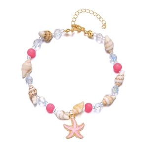 Detailed shot of ocean shell anklet with pink starfish charm and beaded chain detail