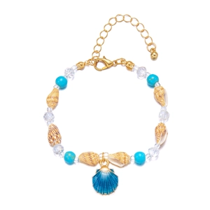Detail of beaded beach bracelet featuring turquoise beads, sea shells and scallop pendant