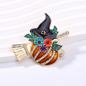 Broche Halloween citrouille et chapeau de sorcière avec strass sur base dorée