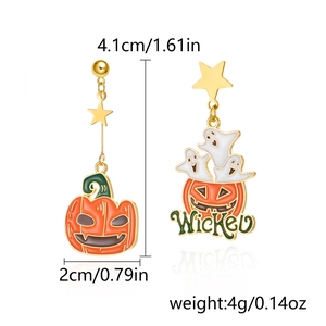 Detail of Halloween earrings showing orange pumpkin and white ghost with Wicked text