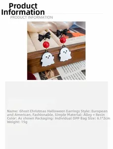Detail view of ghost earrings with black bows and red beads on a display stand