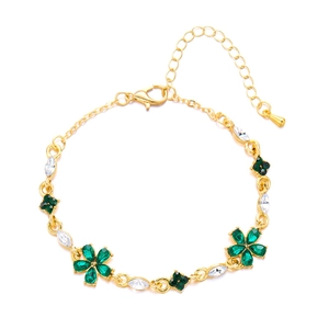Detailansicht Goldarmband mit grünen Blumenkristallen und weißen Marquise-Steinen