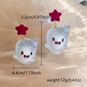 Detail shot of Halloween ghost earrings with red star and sizing labels in inches