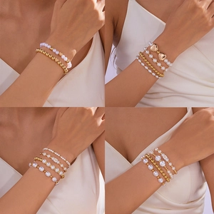 Dames Mode Kunstparel Armband Collectie Goud Hart Hanger Meerlagig Stapelbaar Handgeweven Sieraden Cadeau