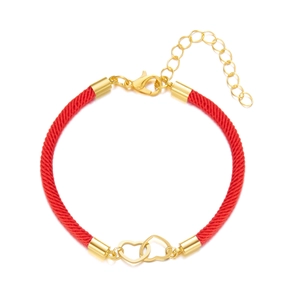 Close-up of red braided rope bracelet with interlocking gold heart charms and lobster clasp