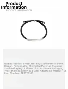 Détail du bracelet en corde noire réglable avec plaque d'identification en acier poli