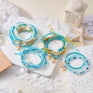 Bohemian multilayer beaded bracelet set with starfish pineapple and evil eye charms
