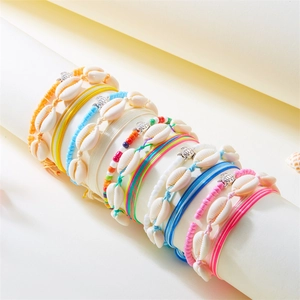 Bohemian seashell and bead bracelet set featuring sea turtle charms for beach summer style
