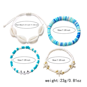 Bohemian seashell bracelet set with starfish charm and SEA letter beads detail