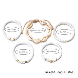 Detail of 5pcs Bohemian bracelet set with white Heishi beads and natural shell charms