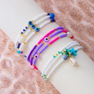 Boho-Fußkettchen-Set mit bösem Blick, bunten Perlen, Seestern und Muschelanhängern