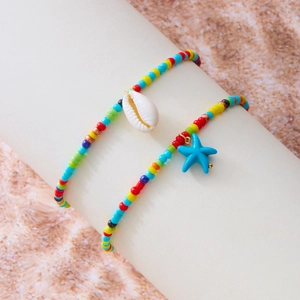 Details von Perlen-Strandschmuck-Set mit blauem Seestern und weißem Muschelanhänger