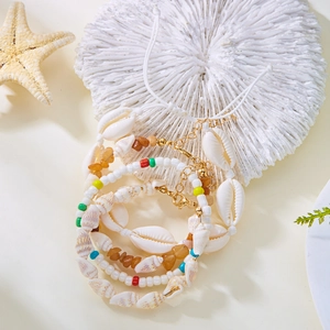 Boho Muschel Armband Set mit bunten Perlen und Naturschalen für das Strand Outfit