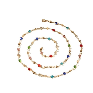 Collana lunga con nappe dorate e cristalli colorati con una delicata catena bohémien