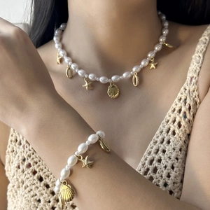 Summer ocean shell pearl necklace and bracelet set with golden starfish and conch charms