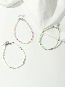 Three-piece bohemian beaded anklet set featuring colorful seed beads and starfish accents