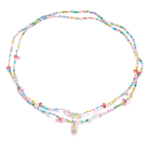 Detail view of Bohemian colorful beads with natural seashell pendant on double-layer waist chain