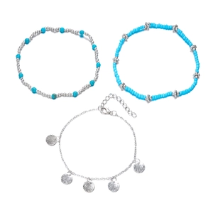 Detail of layered starfish and shell anklet set with turquoise beads and silver charms