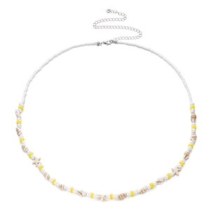 Detail of beach waist chain with sea shells, white beads, and starfish charm