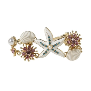 Gold starfish hair clip with white seashells, pink rhinestones and pearls on white background