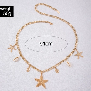 Detail der 91cm Gold-Strand-Taillenkette mit metallischen Seesternen und Muschel-Anhängern