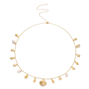 Detail of golden waist chain featuring starfish pendants, sea shells and pearls