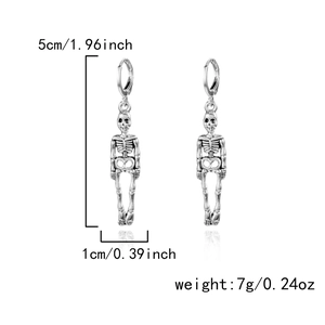 Detailed view of silver skeleton earrings with 5cm length measurements and specs