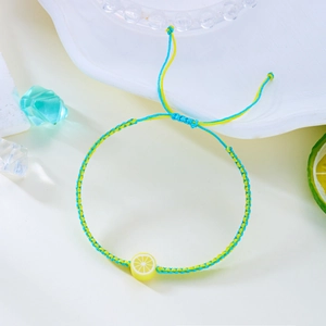 Handgefertigtes Zitronen-Obst-Armband mit verstellbarer blau-gelber Kordel