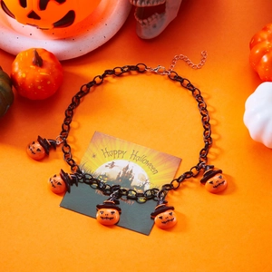 Black chain necklace with five orange pumpkin ghost charms wearing witch hats