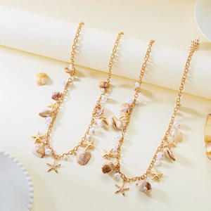 Bohemian gold beach waist chain set with seashell, starfish and pearl charms