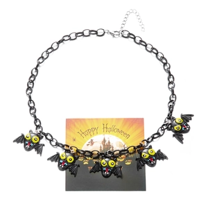 Detail of Halloween bat necklace with five spooky charms and adjustable metal chain