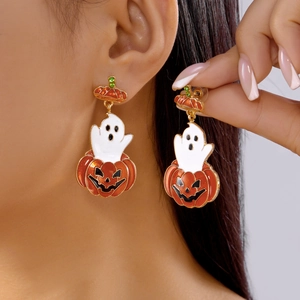 Asymmetric Halloween pumpkin and ghost drop earrings featuring enamel finish and tassels