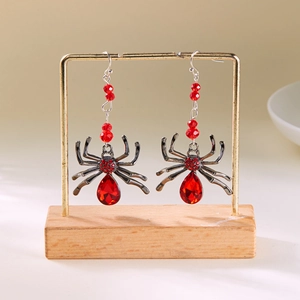 Boucles d'oreilles araignée gothiques avec cristaux rouges et strass pour Halloween