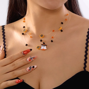 Three-layer Halloween choker with ghost pendant and themed beads on female model