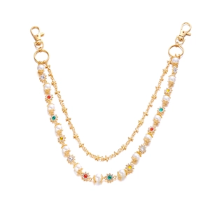 Chaîne multicouche dorée bohème avec perles et breloques de fleurs en strass