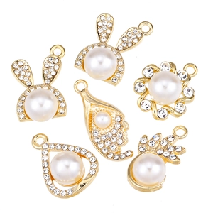 Set of 6 gold DIY jewelry pendants featuring faux pearls, crystals, and bunny designs