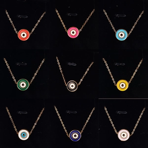Set of nine colorful Turkish Evil Eye pendant necklaces in vintage enamel with gold chains