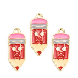 Detail view of cartoon pencil alloy charms with smiling faces for DIY jewelry making