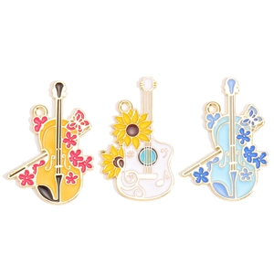 Colorful musical instrument alloy charms including cello and guitar with floral details