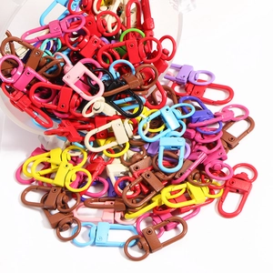 Colorful metal lobster clasps for DIY keychains and bags in various vibrant painted finishes
