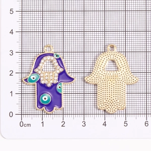 Hamsa Hand hanger met paars emaille, boze oog en strass-steentjes, voor- en achteraanzicht
