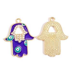 Voor- en achterkant van Hamsa-hanger met blauw emaille, kristallen en boze oog-motief