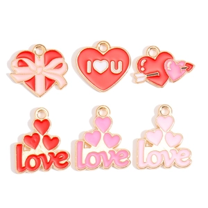 Set of six red and pink heart-shaped enamel charms with gold edges for DIY jewelry making