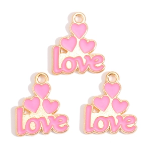 Three pink enamel love heart charms with gold finish for DIY jewelry crafting and earrings