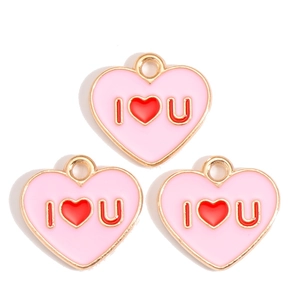 Detailed view of pink enamel I Love U heart charm with gold plating for DIY jewelry