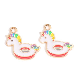 Detail of unicorn charms with golden edges and rainbow gradient hair for DIY jewelry
