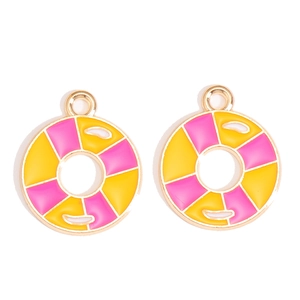 Close-up of pink and yellow enamel lifebuoy charms with gold plating for jewelry DIY
