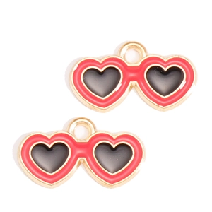 Detail of heart-shaped sunglasses charms in red and black enamel with gold alloy finish
