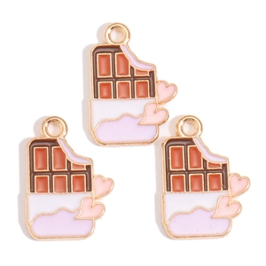 Detail view of chocolate shaped alloy charms with pink hearts and drip oil finish