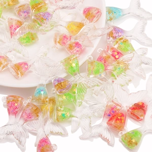 Pendentifs queue de sirène en résine translucide avec paillettes étoiles et feuilles d'or